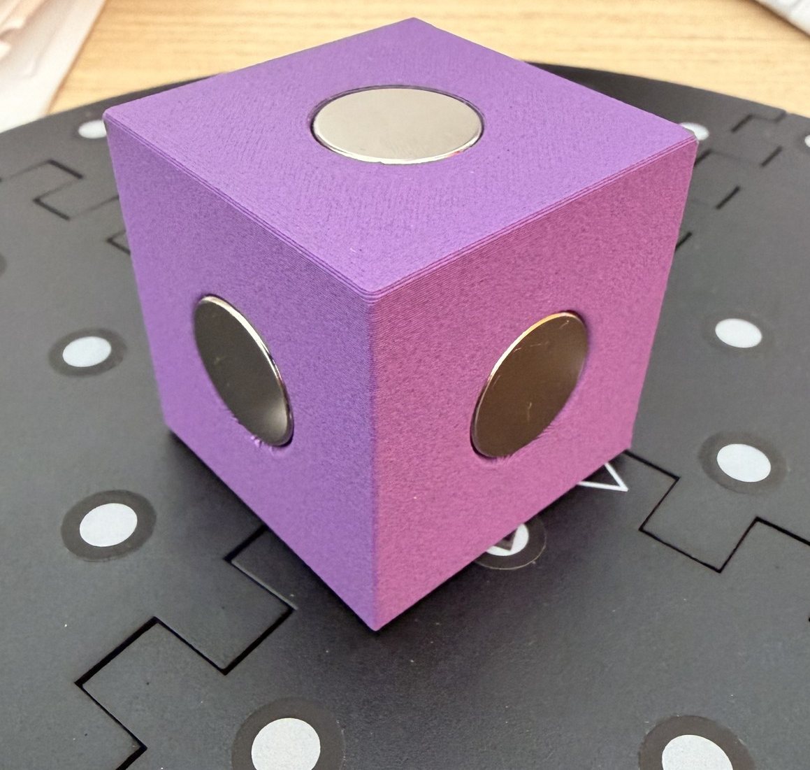 Level block showing three flush nickel magnets on three perpendicular faces